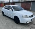 Белый Шевроле Лачетти, объемом двигателя 1.8 л и пробегом 330 тыс. км за 4003 $, фото 1 на Automoto.ua