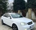 Белый Шевроле Лачетти, объемом двигателя 1.8 л и пробегом 270 тыс. км за 4200 $, фото 1 на Automoto.ua
