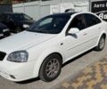 Белый Шевроле Лачетти, объемом двигателя 1.8 л и пробегом 250 тыс. км за 3498 $, фото 1 на Automoto.ua