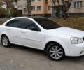 Белый Шевроле Лачетти, объемом двигателя 1.6 л и пробегом 220 тыс. км за 4000 $, фото 1 на Automoto.ua