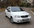 Белый Шевроле Лачетти, объемом двигателя 1.6 л и пробегом 220 тыс. км за 4000 $, фото 1 на Automoto.ua