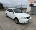 Белый Шевроле Лачетти, объемом двигателя 1.8 л и пробегом 245 тыс. км за 5850 $, фото 1 на Automoto.ua