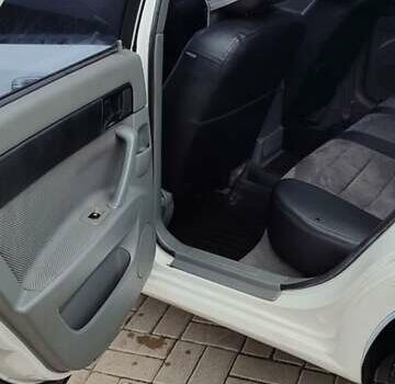 Белый Шевроле Лачетти, объемом двигателя 1.8 л и пробегом 288 тыс. км за 4900 $, фото 14 на Automoto.ua