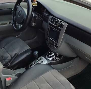 Белый Шевроле Лачетти, объемом двигателя 1.8 л и пробегом 288 тыс. км за 4900 $, фото 18 на Automoto.ua