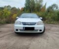 Белый Шевроле Лачетти, объемом двигателя 1.8 л и пробегом 170 тыс. км за 3900 $, фото 1 на Automoto.ua