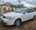 Белый Шевроле Лачетти, объемом двигателя 1.6 л и пробегом 220 тыс. км за 4000 $, фото 1 на Automoto.ua