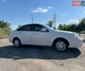 Белый Шевроле Лачетти, объемом двигателя 1.6 л и пробегом 220 тыс. км за 3400 $, фото 1 на Automoto.ua