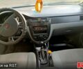 Белый Шевроле Лачетти, объемом двигателя 1.6 л и пробегом 428 тыс. км за 2750 $, фото 3 на Automoto.ua