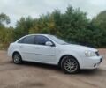 Белый Шевроле Лачетти, объемом двигателя 1.8 л и пробегом 150 тыс. км за 3750 $, фото 1 на Automoto.ua
