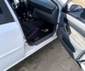 Белый Шевроле Лачетти, объемом двигателя 1.6 л и пробегом 227 тыс. км за 3600 $, фото 1 на Automoto.ua