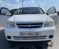 Белый Шевроле Лачетти, объемом двигателя 1.8 л и пробегом 240 тыс. км за 5500 $, фото 1 на Automoto.ua