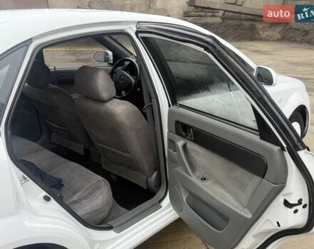 Белый Шевроле Лачетти, объемом двигателя 1.5 л и пробегом 200 тыс. км за 2999 $, фото 15 на Automoto.ua