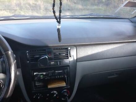 Белый Шевроле Лачетти, объемом двигателя 1.8 л и пробегом 305 тыс. км за 4000 $, фото 1 на Automoto.ua