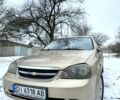 Бежевий Шевроле Лачетті, об'ємом двигуна 1.8 л та пробігом 250 тис. км за 3700 $, фото 1 на Automoto.ua