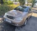 Бежевий Шевроле Лачетті, об'ємом двигуна 1.8 л та пробігом 180 тис. км за 3300 $, фото 1 на Automoto.ua