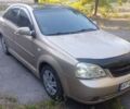 Бежевый Шевроле Лачетти, объемом двигателя 1.8 л и пробегом 210 тыс. км за 2800 $, фото 1 на Automoto.ua