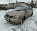 Бежевий Шевроле Лачетті, об'ємом двигуна 1.8 л та пробігом 320 тис. км за 2100 $, фото 1 на Automoto.ua