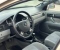 Бежевий Шевроле Лачетті, об'ємом двигуна 1.8 л та пробігом 200 тис. км за 3999 $, фото 8 на Automoto.ua