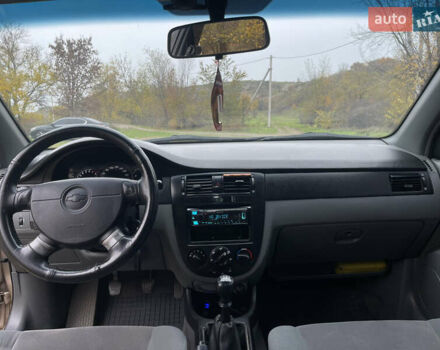 Бежевий Шевроле Лачетті, об'ємом двигуна 1.8 л та пробігом 253 тис. км за 3900 $, фото 17 на Automoto.ua