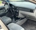 Бежевий Шевроле Лачетті, об'ємом двигуна 1.8 л та пробігом 200 тис. км за 3999 $, фото 9 на Automoto.ua