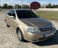 Бежевий Шевроле Лачетті, об'ємом двигуна 1.8 л та пробігом 210 тис. км за 4650 $, фото 1 на Automoto.ua