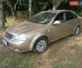 Бежевый Шевроле Лачетти, объемом двигателя 1.8 л и пробегом 210 тыс. км за 3120 $, фото 1 на Automoto.ua
