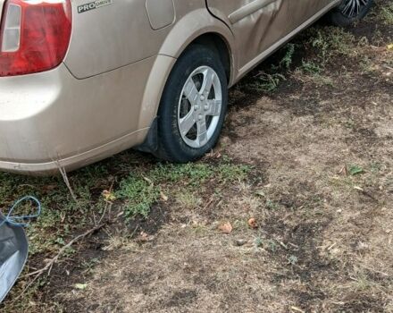 Бежевий Шевроле Лачетті, об'ємом двигуна 1.8 л та пробігом 300 тис. км за 960 $, фото 4 на Automoto.ua