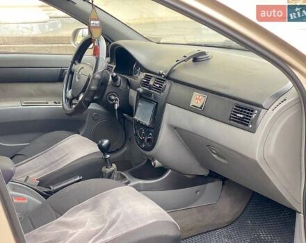 Бежевий Шевроле Лачетті, об'ємом двигуна 1.8 л та пробігом 235 тис. км за 2950 $, фото 9 на Automoto.ua