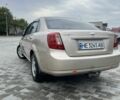 Бежевый Шевроле Лачетти, объемом двигателя 1.8 л и пробегом 260 тыс. км за 5600 $, фото 2 на Automoto.ua