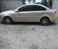 Бежевий Шевроле Лачетті, об'ємом двигуна 1.8 л та пробігом 36 тис. км за 9500 $, фото 1 на Automoto.ua