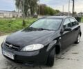 Черный Шевроле Лачетти, объемом двигателя 1.6 л и пробегом 215 тыс. км за 2758 $, фото 1 на Automoto.ua