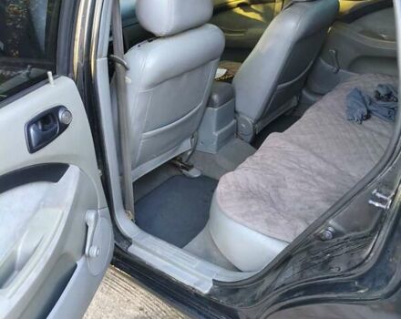 Черный Шевроле Лачетти, объемом двигателя 1.6 л и пробегом 480 тыс. км за 3800 $, фото 6 на Automoto.ua