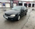 Черный Шевроле Лачетти, объемом двигателя 1.6 л и пробегом 220 тыс. км за 3300 $, фото 1 на Automoto.ua