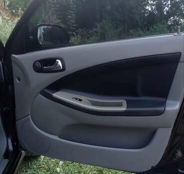 Черный Шевроле Лачетти, объемом двигателя 1.8 л и пробегом 180 тыс. км за 4100 $, фото 8 на Automoto.ua