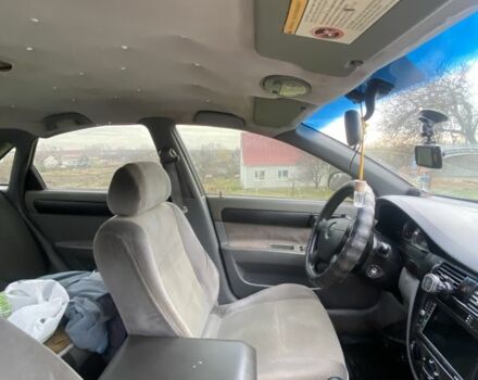 Черный Шевроле Лачетти, объемом двигателя 1.6 л и пробегом 250 тыс. км за 2600 $, фото 4 на Automoto.ua