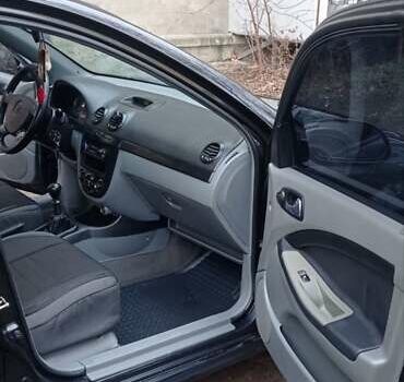 Черный Шевроле Лачетти, объемом двигателя 1.8 л и пробегом 180 тыс. км за 4100 $, фото 7 на Automoto.ua