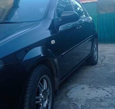 Черный Шевроле Лачетти, объемом двигателя 1.8 л и пробегом 180 тыс. км за 4100 $, фото 31 на Automoto.ua