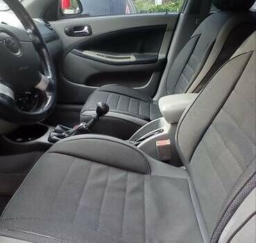 Черный Шевроле Лачетти, объемом двигателя 1.8 л и пробегом 180 тыс. км за 4100 $, фото 11 на Automoto.ua