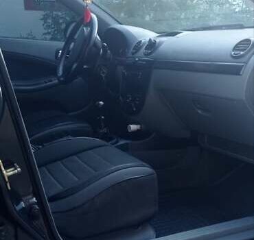 Черный Шевроле Лачетти, объемом двигателя 1.8 л и пробегом 180 тыс. км за 4100 $, фото 28 на Automoto.ua