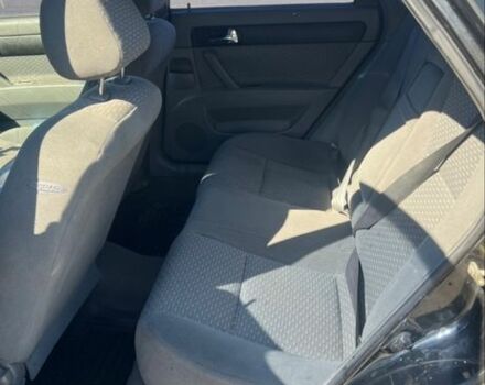 Черный Шевроле Лачетти, объемом двигателя 1.8 л и пробегом 220 тыс. км за 3200 $, фото 4 на Automoto.ua