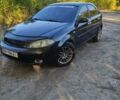 Черный Шевроле Лачетти, объемом двигателя 1.6 л и пробегом 480 тыс. км за 3800 $, фото 1 на Automoto.ua