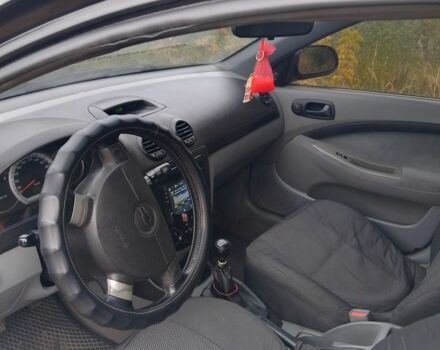 Черный Шевроле Лачетти, объемом двигателя 1.6 л и пробегом 244 тыс. км за 3600 $, фото 4 на Automoto.ua