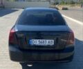 Черный Шевроле Лачетти, объемом двигателя 1.8 л и пробегом 220 тыс. км за 3200 $, фото 1 на Automoto.ua