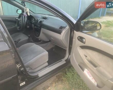 Черный Шевроле Лачетти, объемом двигателя 1.6 л и пробегом 305 тыс. км за 3700 $, фото 3 на Automoto.ua