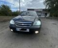 Чорний Шевроле Лачетті, об'ємом двигуна 1.6 л та пробігом 250 тис. км за 4718 $, фото 1 на Automoto.ua