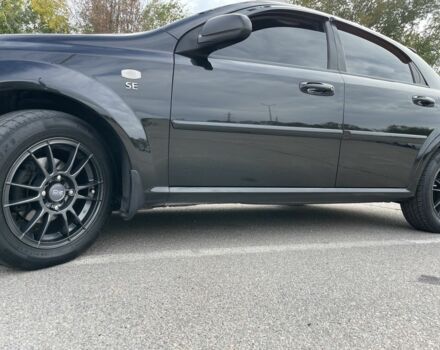 Черный Шевроле Лачетти, объемом двигателя 1.6 л и пробегом 144 тыс. км за 5100 $, фото 11 на Automoto.ua