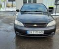 Черный Шевроле Лачетти, объемом двигателя 1.6 л и пробегом 232 тыс. км за 4700 $, фото 1 на Automoto.ua