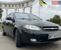 Черный Шевроле Лачетти, объемом двигателя 1.8 л и пробегом 253 тыс. км за 4600 $, фото 1 на Automoto.ua