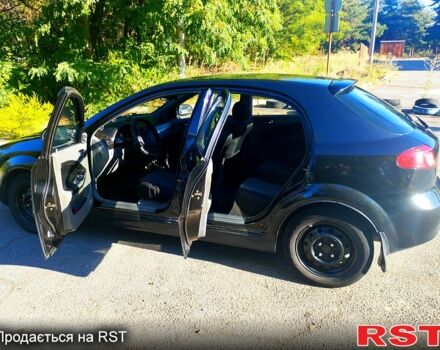 Черный Шевроле Лачетти, объемом двигателя 1.8 л и пробегом 233 тыс. км за 3200 $, фото 4 на Automoto.ua