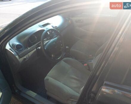 Черный Шевроле Лачетти, объемом двигателя 1.6 л и пробегом 284 тыс. км за 3700 $, фото 4 на Automoto.ua